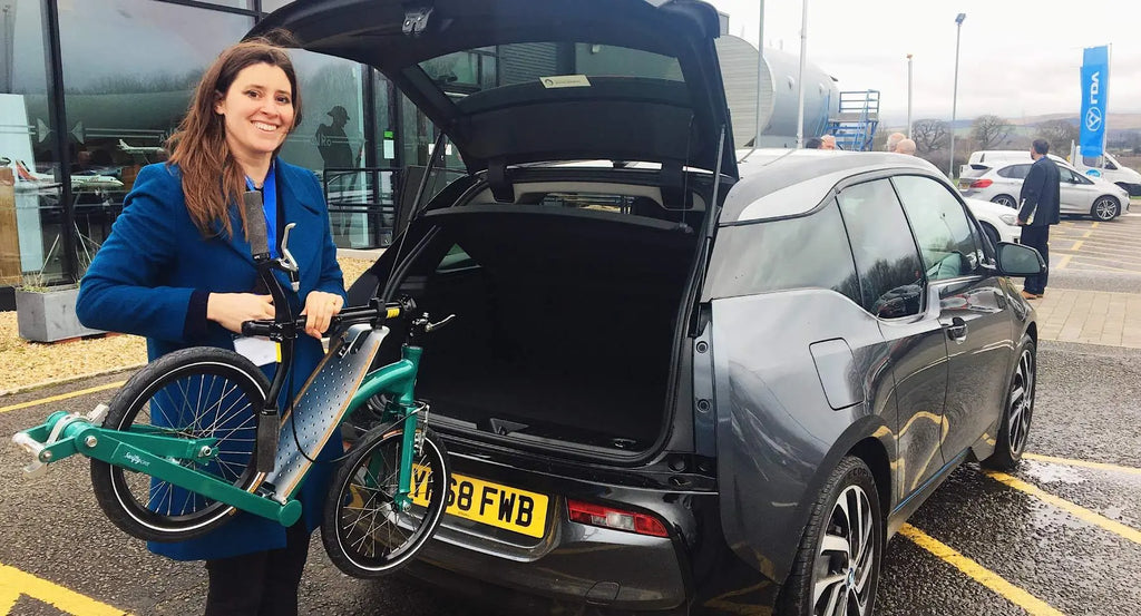 electric car and adult scooter, park and ride