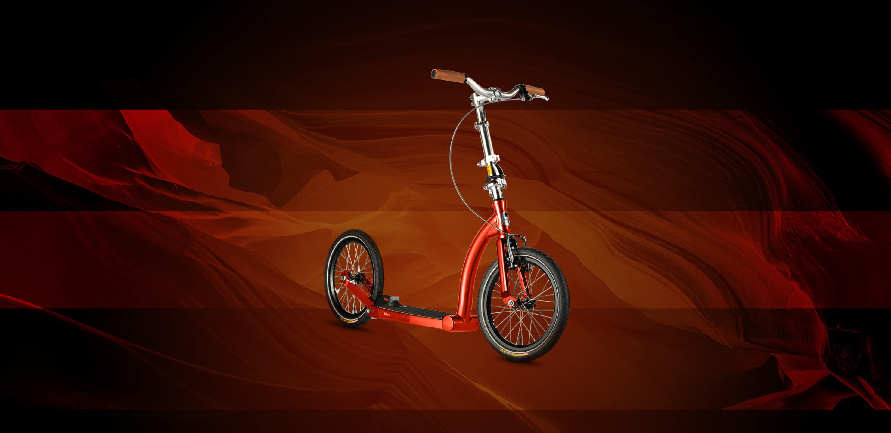 metallic red coloured big wheel scooter